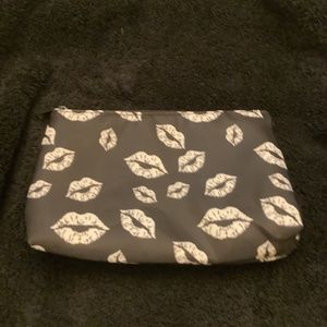 Cute vinyl makeup bag with zipper and waterproof lining. NEW.